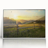 Framed wall art featuring a serene countryside landscape design, showcasing vibrant green fields and a clear blue sky, perfect for home decor enhancement.