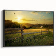 Framed canvas wall art showcasing a serene countryside landscape design with lush greenery and a tranquil sky, presented from a black side view perspective.