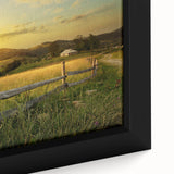 Framed canvas wall art depicting a serene countryside landscape, showcasing vibrant green fields and a clear blue sky, ideal for home decor and nature lovers.