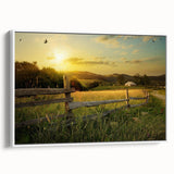 Framed canvas wall art showcasing a serene countryside landscape with rolling hills, lush greenery, and a soft color palette, ideal for home decor.