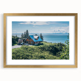 Elegant gold-framed wall art showcasing a serene countryside landscape with vibrant colors, perfect for home decor. The artwork is matted for a refined finish.