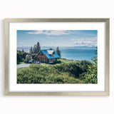 Framed wall art featuring a serene countryside landscape design, accented with a silver mat, ideal for enhancing home decor with nature-inspired elegance.