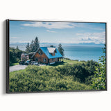 Framed canvas wall art showcasing a serene countryside landscape with lush greenery and rolling hills, featuring a sleek black frame that enhances its vibrant colors.