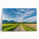 Stretched canvas artwork showcasing a vibrant countryside landscape design, featuring rolling hills and a serene sky, perfect for home decor and art enthusiasts.