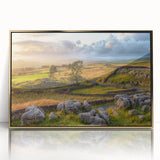 Framed acrylic wall art depicting a serene countryside landscape in soft pastel colors, highlighted by a gold frame, perfect for home decor.