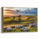 Framed canvas wall art showcasing a serene countryside landscape with lush green fields and a golden sunset, enhancing home decor with a nature-inspired touch.