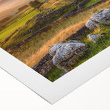 Rolled canvas artwork showcasing a serene countryside landscape with lush greenery and rolling hills, designed for wall decoration. Packaged in a protective tube.