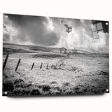 Acrylic glass wall art showcasing a serene countryside landscape design, featuring vibrant colors and detailed elements, displayed in a side view with decorative pins.