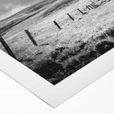 Rolled canvas showcasing a serene countryside landscape design, featuring vibrant greens and soft blues, perfect for home decor. Packaged securely in a protective tube for shipping.