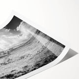 Rolling countryside landscape wall art print showcasing vibrant green fields, majestic mountains, and a serene sky, perfect for home decor and art enthusiasts.