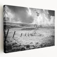 Stretched canvas wall art showcasing a serene countryside landscape with vibrant green fields and a tranquil blue sky, perfect for home decor.