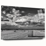 Acrylic glass wall art piece showcasing a serene countryside landscape, featuring vibrant green fields and a clear blue sky, complemented by decorative pins for easy hanging.