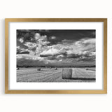 Gold-framed wall art featuring a serene countryside landscape design, showcasing lush greenery and rolling hills, ideal for enhancing home decor aesthetics.