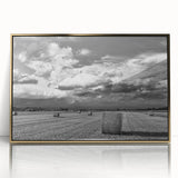 Framed wall art showcasing a picturesque countryside landscape with vibrant colors and gold accents, ideal for enhancing home decor and adding warmth to interiors.