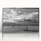 Framed acrylic wall art showcasing a serene countryside landscape with vibrant green fields and a cloudy sky, elegantly designed for modern decor.