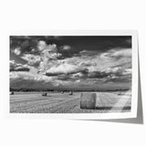Vibrant countryside landscape wall art print showcasing rolling hills and a serene sky, rolled for shipping in a protective tube, ideal for home decor.