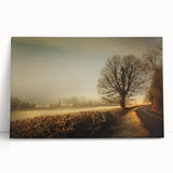 Stretched canvas wall art collection showcasing serene countryside landscapes, featuring vibrant greens and soft blues, elegantly leaning against a wall for a cozy decor touch.