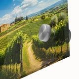 Close-up of a vibrant acrylic glass wall art piece showcasing a picturesque countryside landscape, featuring rolling hills, lush greenery, and a serene sky, perfect for home decor.