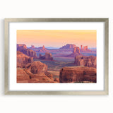 Framed silver wall art depicting a serene desert landscape, featuring warm earth tones and subtle details, perfect for enhancing modern home decor.