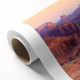 Desert landscape wall art on rolled canvas, showcasing warm tones of orange and brown, perfect for adding a serene touch to home decor. Ideal for nature lovers.