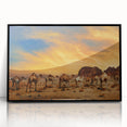 Framed acrylic wall art featuring a vibrant desert landscape design, showcasing hues of orange and blue, with a sleek black frame, ideal for modern decor.
