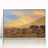 Framed acrylic wall art of a serene desert landscape in a white frame, showcasing warm earth tones and dramatic skies, perfect for home decor.