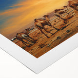 Vibrant desert landscape wall art design on rolled canvas, showcasing warm hues of orange and yellow, perfect for enhancing modern interior decor.