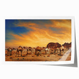 Vibrant desert landscape wall art print showcasing warm hues of orange and yellow, rolled for easy display and shipping, perfect for home decor.