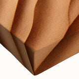 Desert landscape wall art design featuring vibrant hues of orange and yellow on a stretched canvas, capturing the essence of arid beauty in a close-up view.