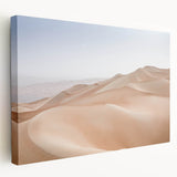 Stretched canvas wall art showcasing a vibrant desert landscape with warm tones of orange and red, perfect for enhancing modern home decor aesthetics.