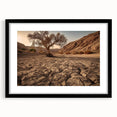 Framed wall art featuring a stunning desert landscape design with a black mat and sleek frame, perfect for enhancing modern home decor. The vibrant colors and intricate details evoke a serene and expansive natural beauty, ideal for living rooms or offices.