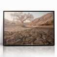 Framed acrylic wall art showcasing a vibrant desert landscape design, featuring warm earth tones and intricate details, perfect for modern home decor.