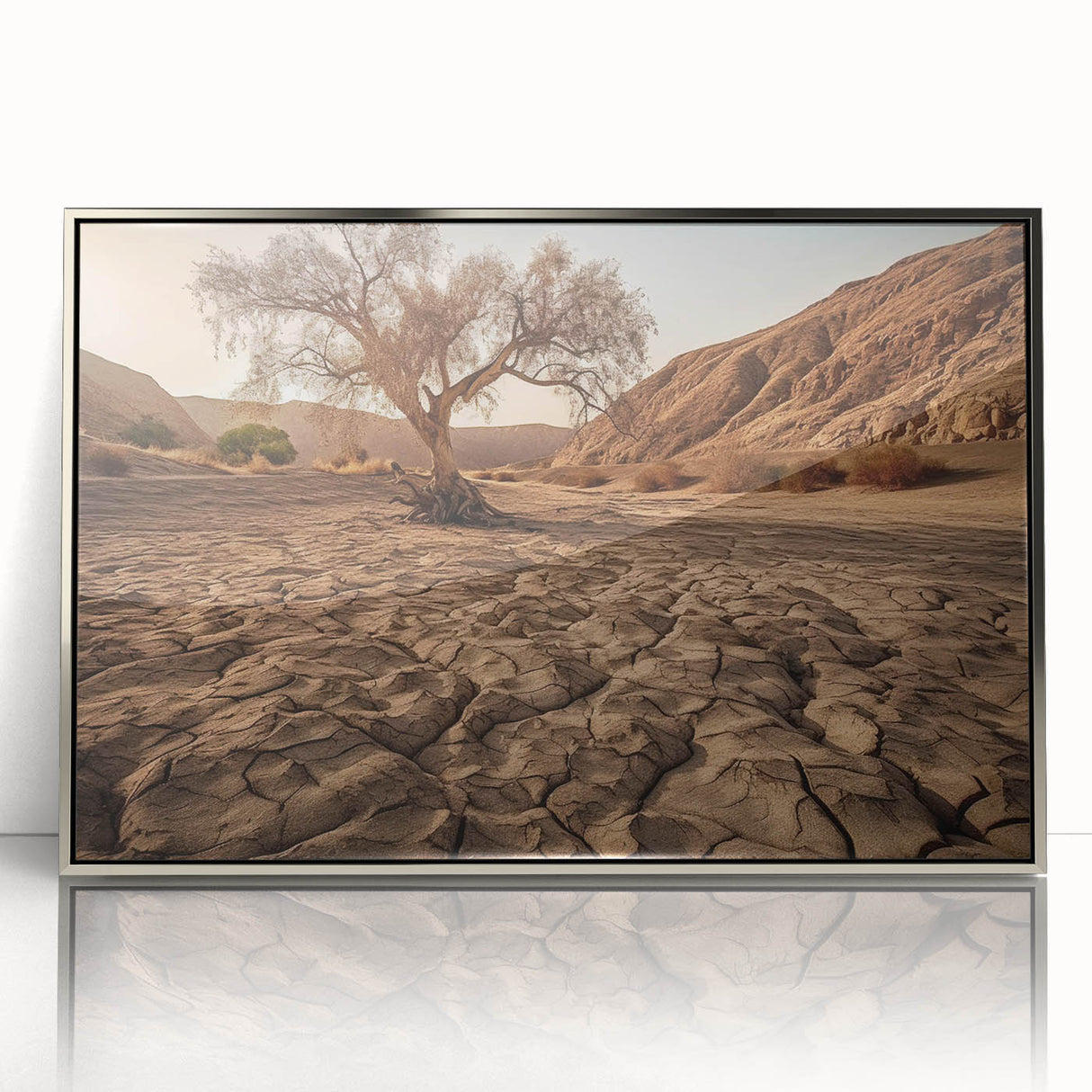 Framed acrylic wall art showcasing a serene desert landscape with warm tones of orange and gold, perfect for enhancing modern home decor. The sleek silver frame adds elegance to any setting, making it ideal for living rooms or offices.