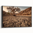 Framed canvas wall art showcasing a stunning desert landscape design, featuring warm tones of orange and beige, with a sleek black frame, perfect for modern decor.