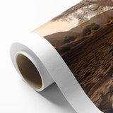 Desert landscape wall art on rolled canvas, showcasing warm earthy tones and intricate details, perfect for home decor, packaged securely in a cardboard tube.