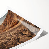 Desert landscape wall art print showcasing vibrant hues of orange and yellow, rolled and ready for display, ideal for home décor or artistic enhancement.