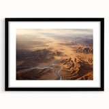 Framed black wall art showcasing a stunning desert landscape design, featuring warm tones of orange and brown. Perfect for modern home decor and art enthusiasts.