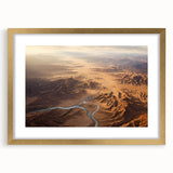 Framed wall art showcasing a desert landscape design, featuring golden accents and a mat border, ideal for modern home decor, enhancing interior aesthetics.