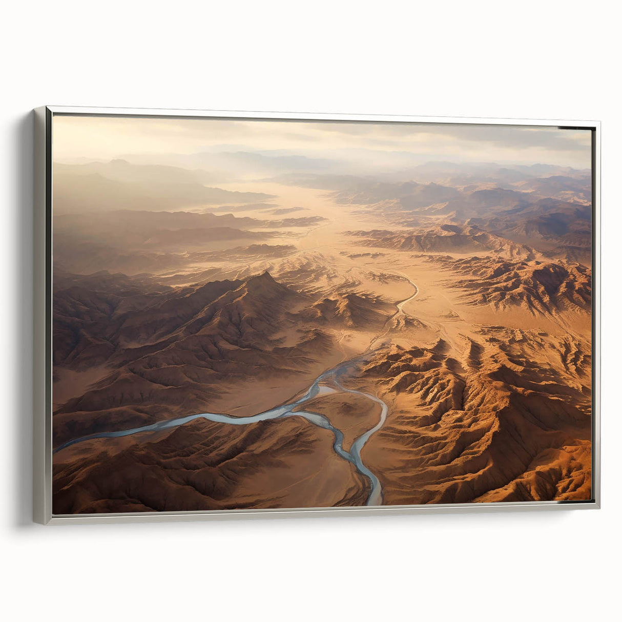 Framed wall art showcasing a contemporary desert landscape design, featuring warm tones of orange and brown with a sleek silver frame, ideal for modern home decor.