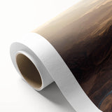 Rolled canvas wall art showcasing a vibrant desert landscape design with warm earthy tones, ideal for home decor. Arrives securely packaged in a cardboard tube.