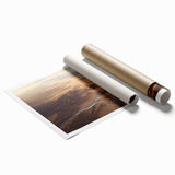 Desert landscape wall art print showcasing vibrant sunset hues and intricate rock formations, rolled and ready for framing in a protective cardboard tube.