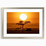 Framed wall art depicting a serene desert landscape, featuring soft earth tones and a silver mat, ideal for modern home decor. Perfect for enhancing any living space's ambiance.