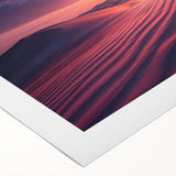 Desert-themed rolled canvas wall art featuring vibrant, abstract landscapes with warm tones of orange and yellow, ideal for modern home decor.