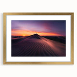 Framed wall art showcasing a stunning desert landscape design, featuring warm gold accents and a mat border, perfect for modern home decor.
