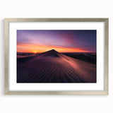 Framed desert landscape wall art collection showcasing serene hues of orange and blue, featuring a silver mat and modern design, ideal for home decor enhancement.