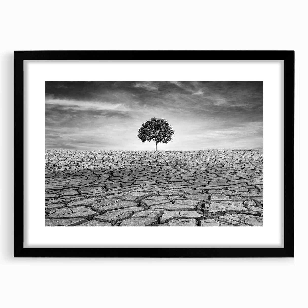 Framed wall art display featuring a stunning desert landscape design, with a black mat and sleek frame, perfect for modern home decor or office aesthetics.