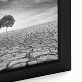 Close-up of a framed canvas showcasing a vibrant desert landscape design, featuring rich earthy tones and intricate details, perfect for modern home decor.