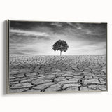 Framed canvas wall art showcasing a desert landscape design with vibrant colors, featuring a silver frame and side view display, ideal for modern home decor.