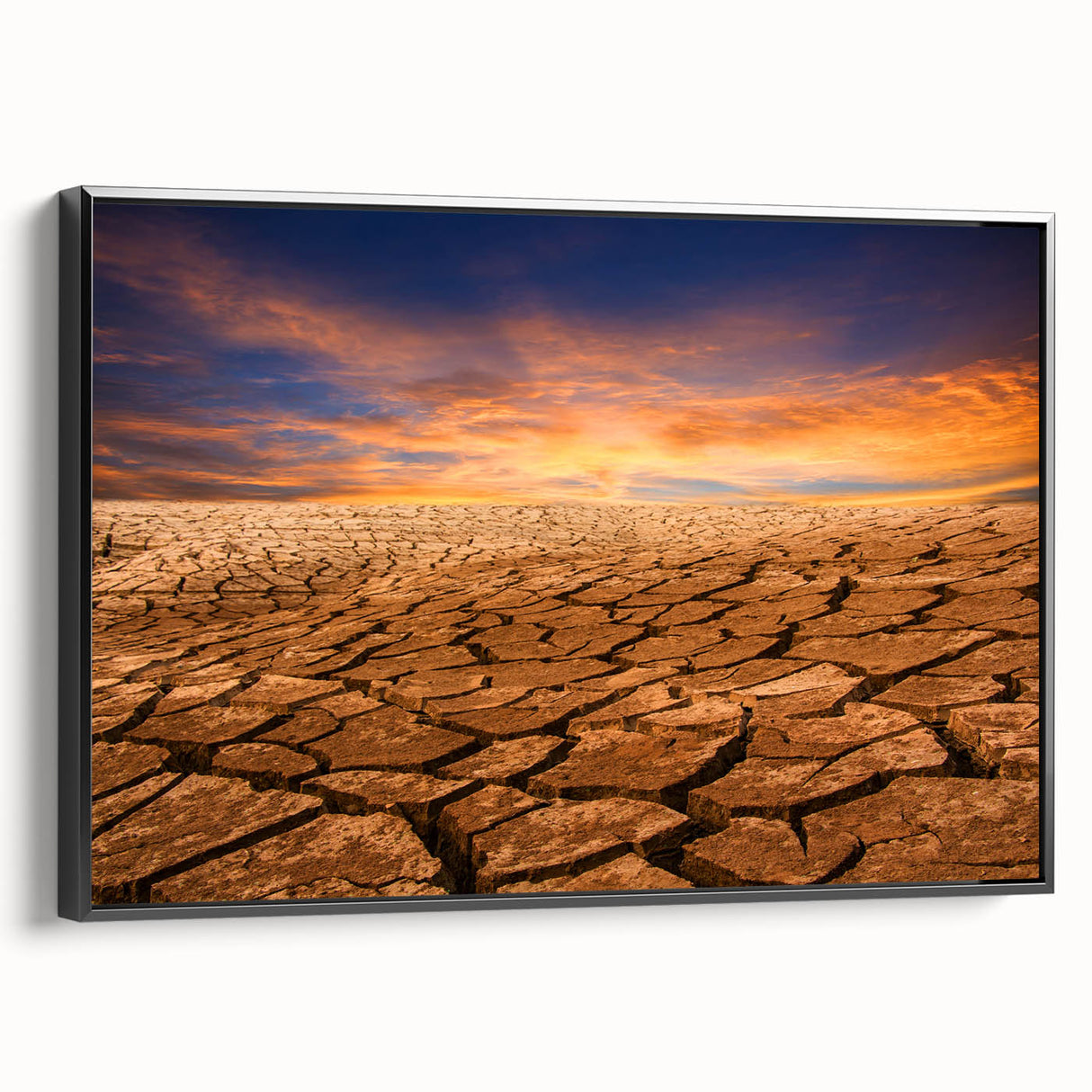 Framed canvas wall art showcasing a stunning desert landscape design in warm tones, presented from a black side view, perfect for modern home decor.