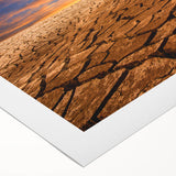Vibrant desert landscape wall art design on rolled canvas, showcasing rich oranges and blues, perfect for enhancing modern home decor. Ideal for art enthusiasts.